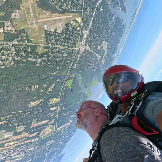 Freefall skydive by the New York coastline.